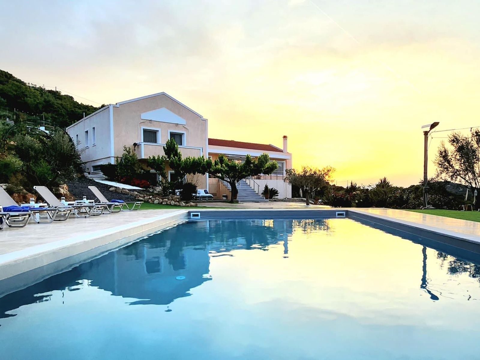 Sunset over the sea on the island of Evia, Greece, near Villa Amfiario